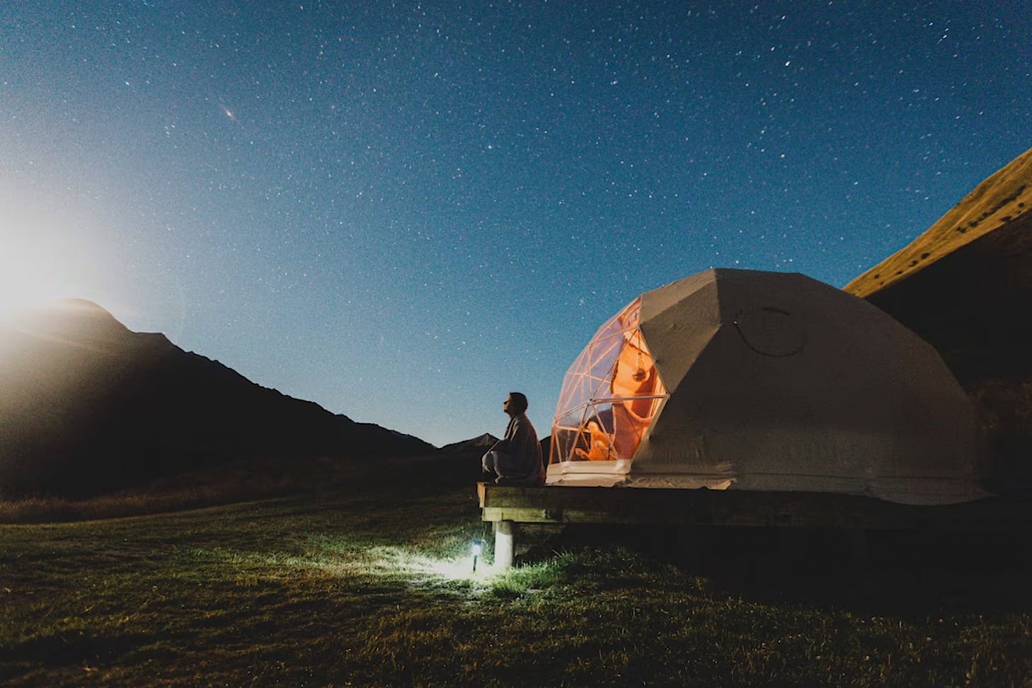 A star gazer sits on the deck area of Seffers Dome.